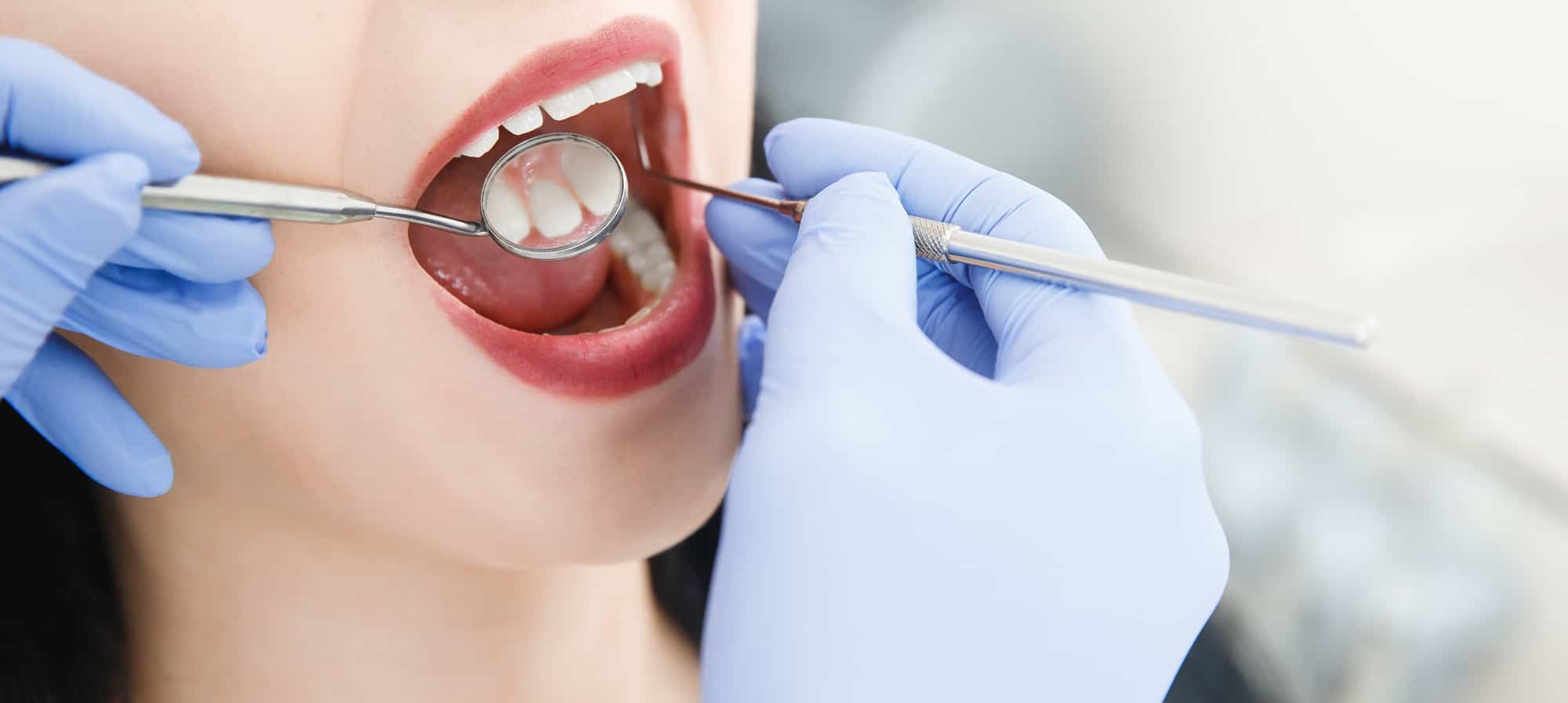 what are the symptoms of oral cancer